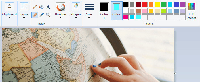 Set the background color to one not frequently used and erase to start making the background transparent in Paint