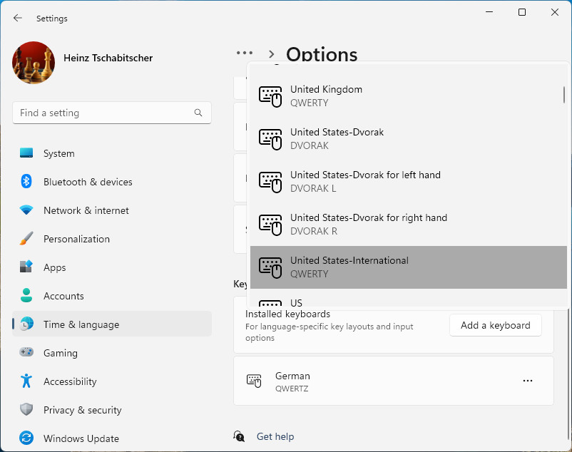 Select “United States-International” to add the US-International keyboard layout to Windows
