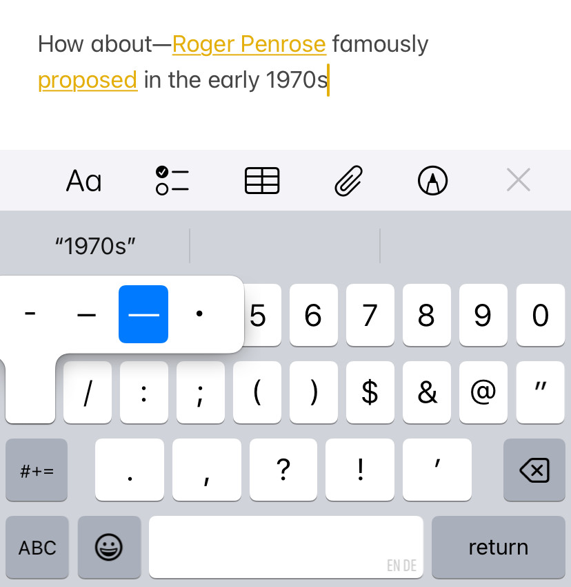 Inserting an em dash on an iPhone using the keyboard