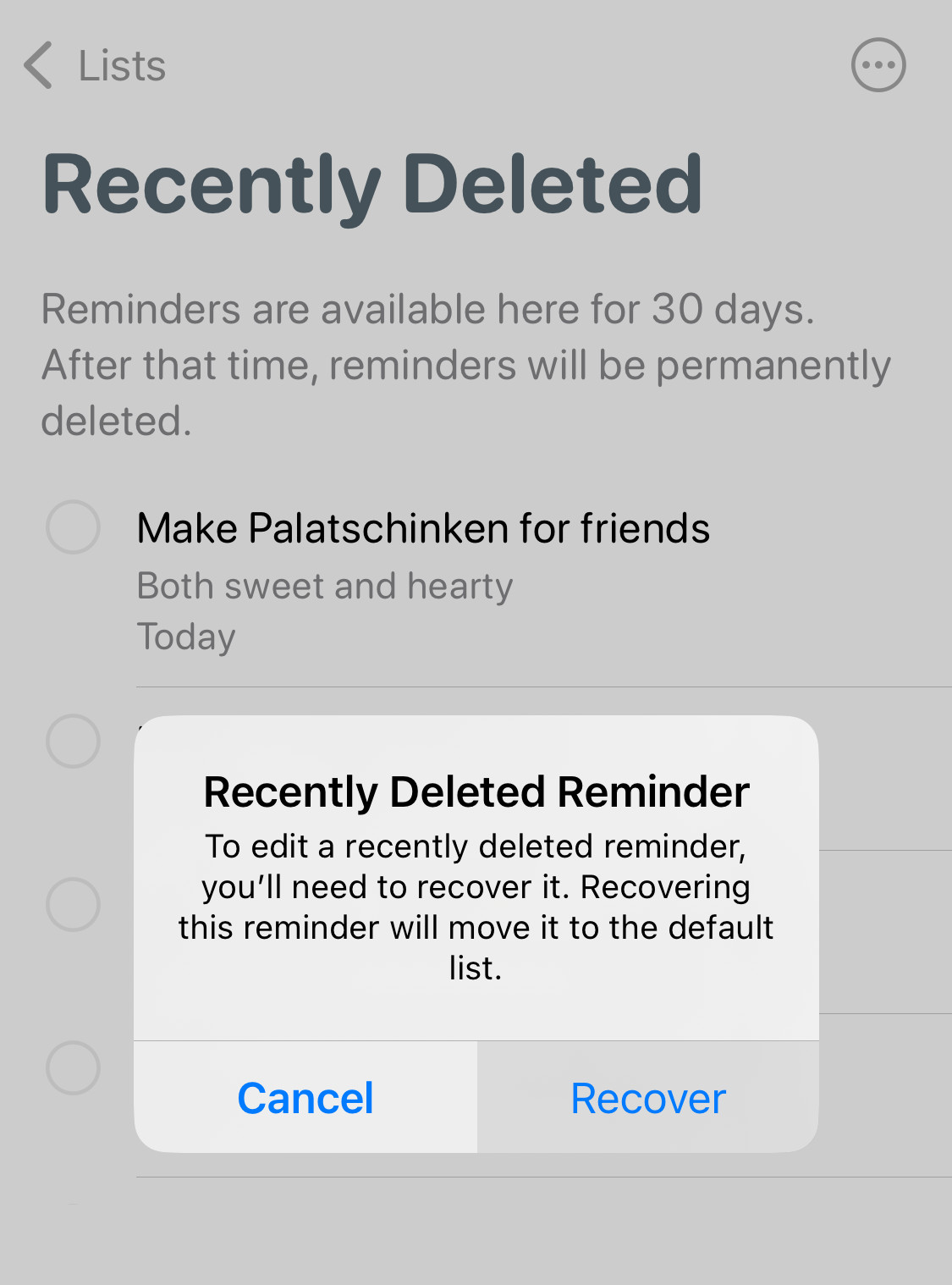 Tap “Recover” to restore a deleted task to the default list in Apple Reminders for iPhone
