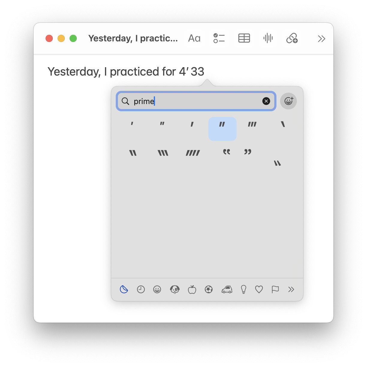 Inserting the second symbol on a Mac using the emoji panel