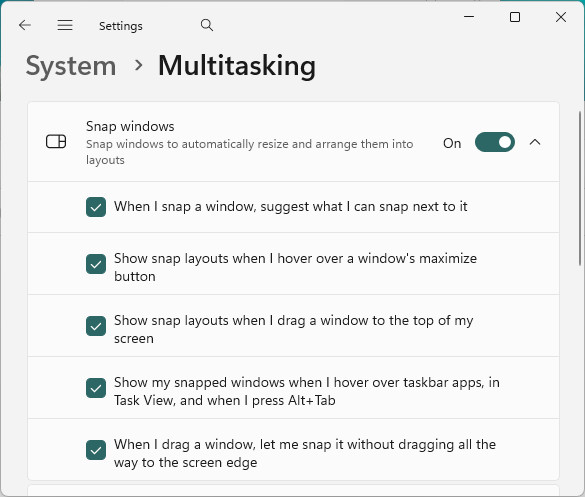 Turn on “Snap windows” in Windows 11 settings to automatically resize and tile windows