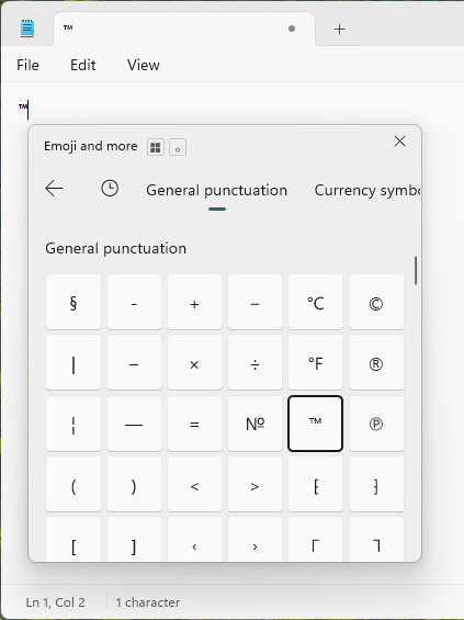 Using the emoji panel to insert the trademark symbol
